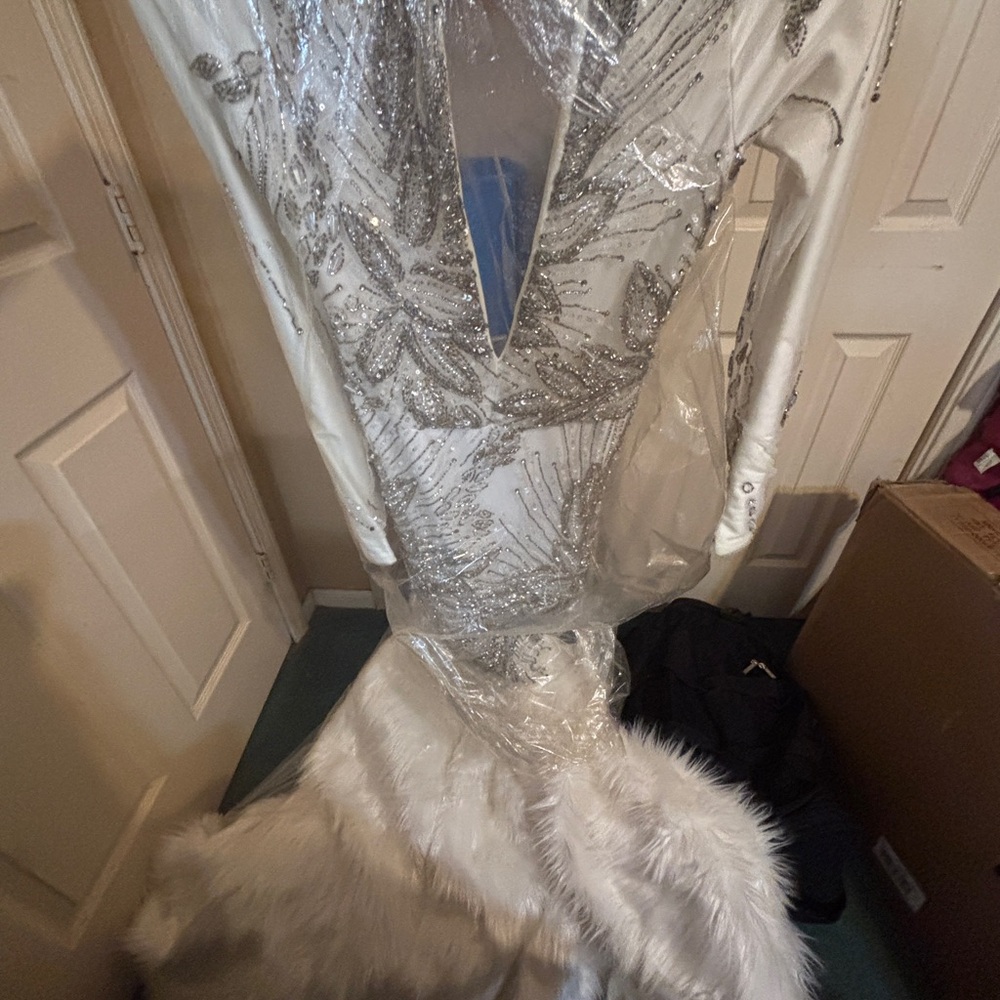 Elegant Silver Sequin Gown with Faux Fur Trim